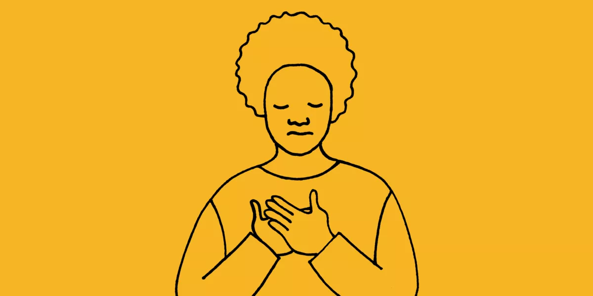 Line drawing of woman with hands on heart