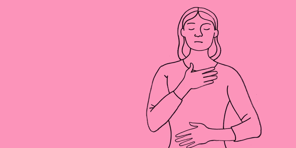Image of woman with hands on heart and belly
